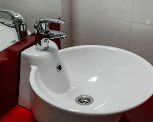 bathroom-interior-with-round-sink-and-faucet-on-re-2026-03-17-07-15-51-utc